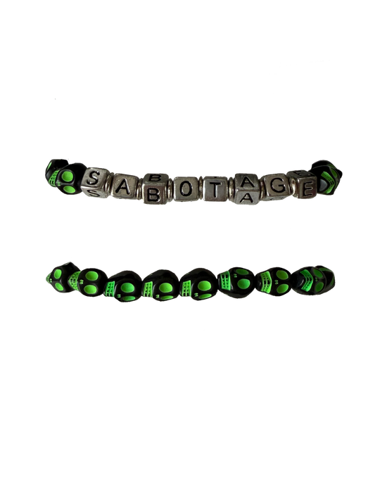 SABOTAGE CRÂNE BRACELET (NEON GREEN AND BLACK)