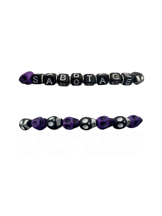 SABOTAGE CRÂNE BRACELET (PURPLE AND BLACK)